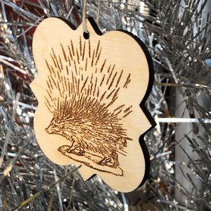 The Lonely Porcupine from our Realm of the Elderlings birch hanging ornaments. Laser etched with fanart images from the Robin Hobb Fantasy book series.